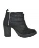 Black gothic embossed leather boots with high heel and silver buckles – elegant, dark, and refined.