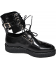 Creepers basse in pelle nera con allacciatura alla caviglia e anelli metallici – Nevermind
