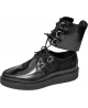 Nevermind black leather low creepers with ankle lacing and metal rings.