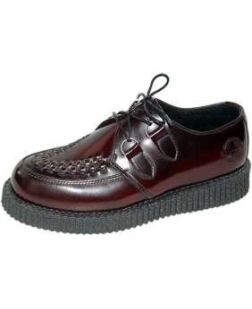 Nevermind shiny burgundy creepers – a union of refinement and alternative heritage.