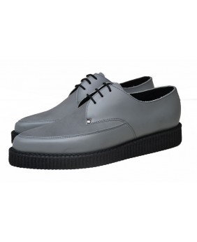 Creepers pointues Nevermind en cuir lisse et suédine grise avec semelle noire.