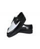 Spitze Creepers aus schwarz-weißem Leder – Nevermind