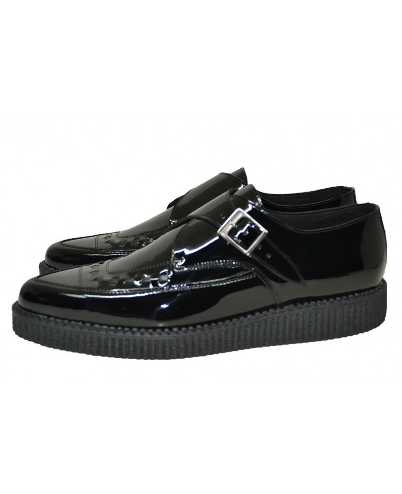 Creepers Nevermind puntiagudos en charol negro con hebilla.