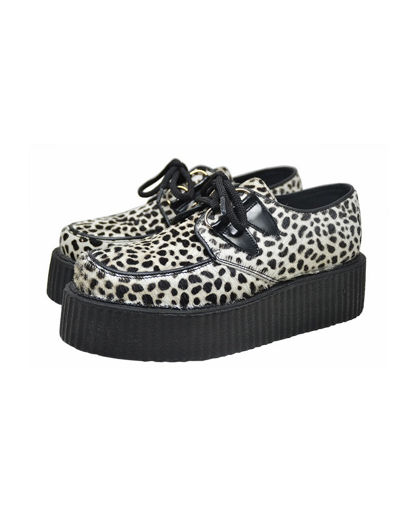 Nevermind white cowhide creepers with black leopard print – wild, bold, and underground.
