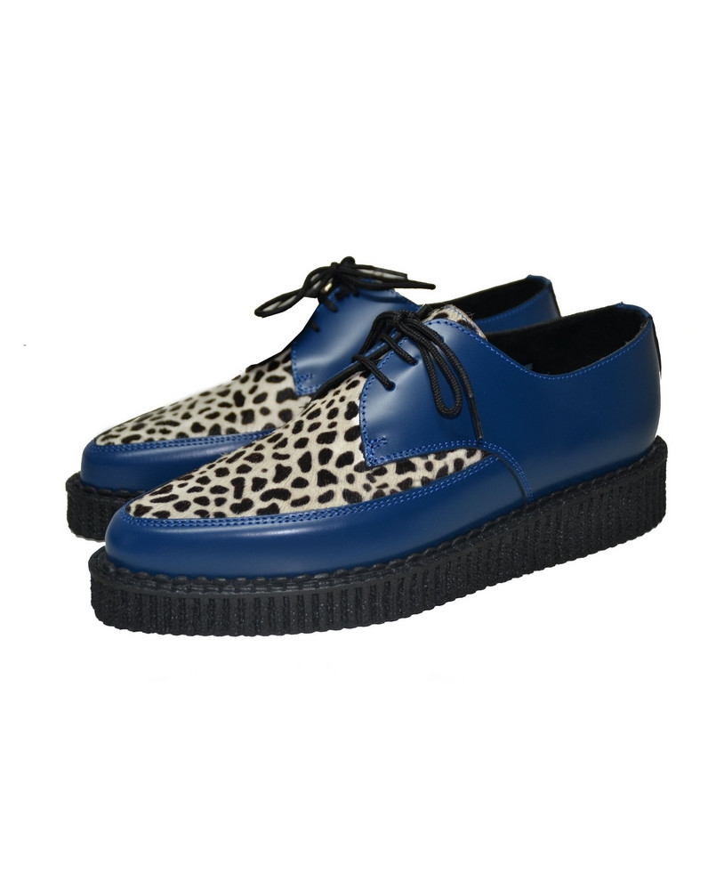Creepers Nevermind à bout pointu en cuir bleu et fourrure bovine léopard.