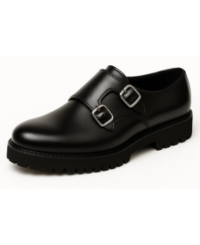 Black leather shoe with double buckle and lug sole, designed by Nevermind.