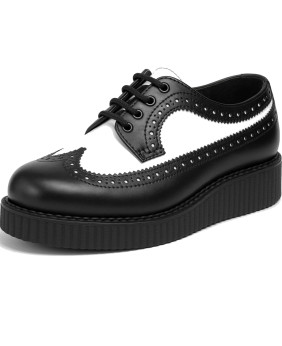 Nevermind black and white creepers with brogue perforations and ridged sole.
