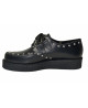 Creepers Nevermind pelle nera con borchie – suola semplice.