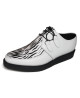 Creepers Nevermind en cuero blanco con estampado de cebra, suela de goma negra de 3 cm.