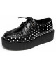Creepers NEVERMIND in pelle nera a pois bianchi con doppia suola nera.