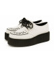 Nevermind white nubuck creepers with black platform sole – minimalism meets boldness.