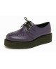 Creepers Nevermind en cuir lisse violet avec tressage artisanal et semelle noire épaisse.