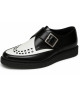 Creepers Nevermind a punta in pelle nera e bianca con fibbia metallica.