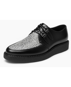 Creepers Nevermind à bout pointu en cuir noir et imprimé animalier noir et blanc.