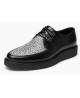 Nevermind Creepers spitz aus schwarzem Leder mit schwarz-weißem Animalprint.