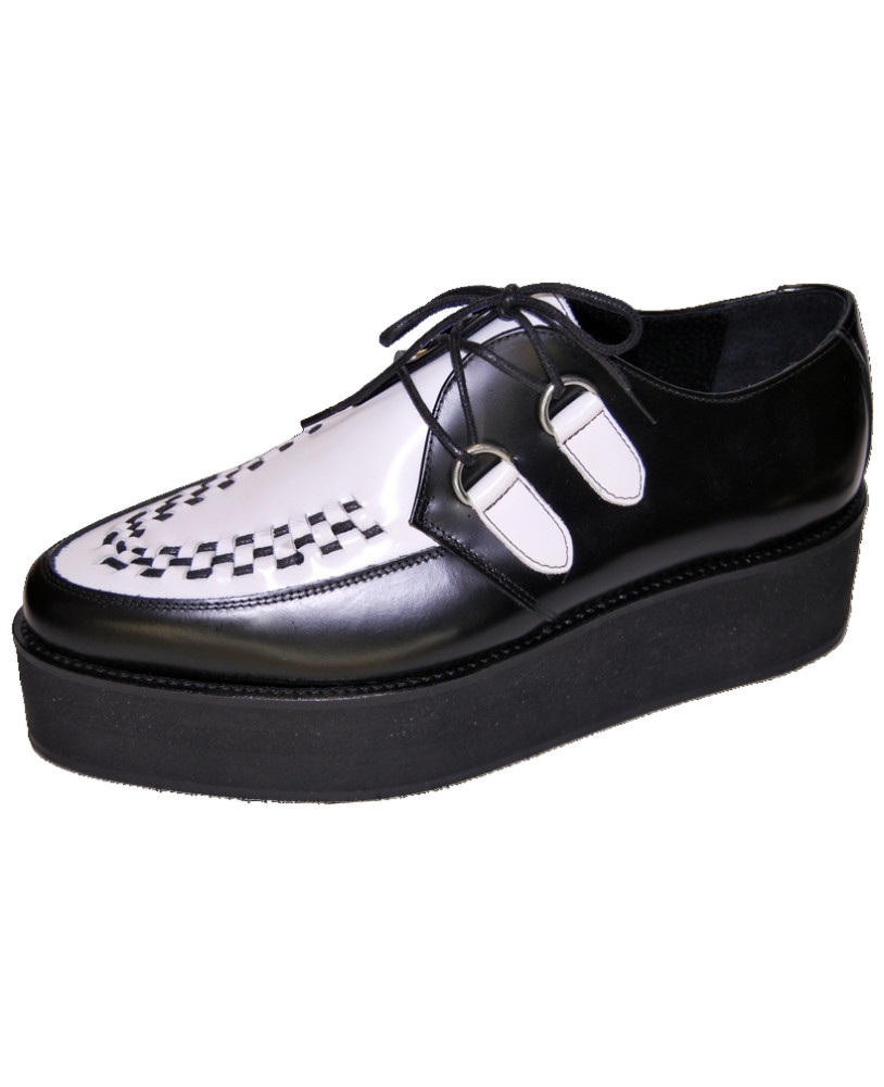 Creepers puntiagudos Nevermind en cuero negro y blanco con motivo ajedrezado y suela plataforma negra lisa.