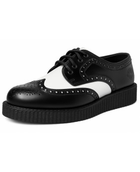 Nevermind black and white leather creepers with decorative perforations and ridged sole.