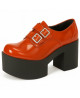 Nevermind orange patent platform shoes, 70s glam rock style