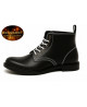 Black leather ankle boots with white stitching and white laces.