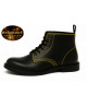 Black leather ankle boots with yellow stitching and black laces.