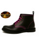 Black leather ankle boots with pink stitching and pink laces.
