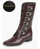Lilac Steel Web boots with spiderweb-embossed leather and six silver stylized-skull buckles.