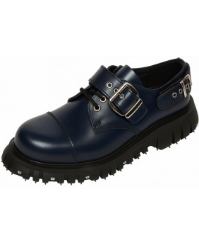 Navy leather rangers shoe with buckles and decorative screws.