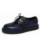 Creepers de cuero azul patinado, suela simple — elegancia underground y comodidad duradera.