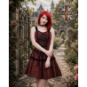 Un abito in tartan impreziosito da un'elegante allacciatura a corsetto e da una gonna dal volume perfetto.